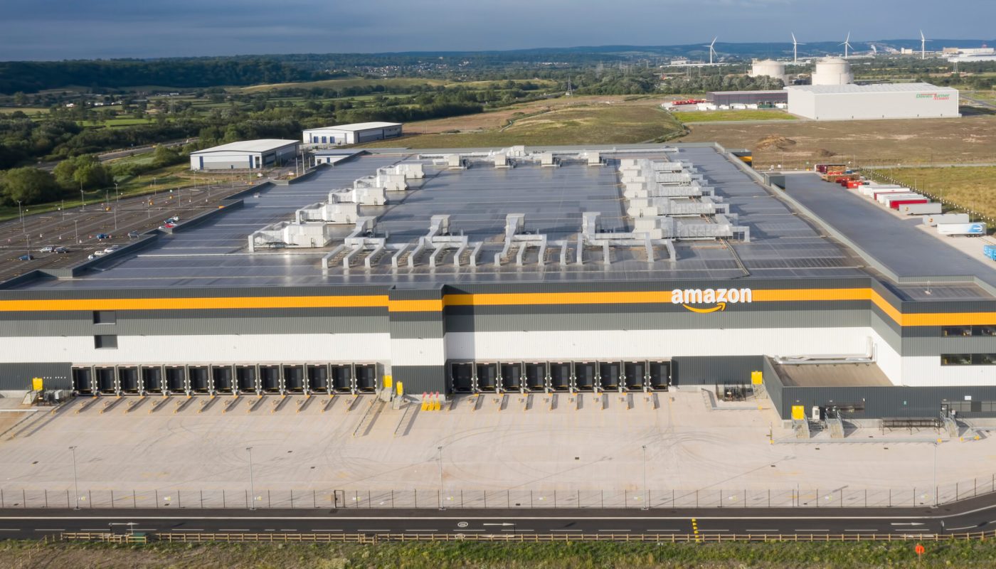 AVONMOUTH UK - JULY 13, 2019: Amazon warehouse & distribution centre building handles online shopping retail internet & technology business development